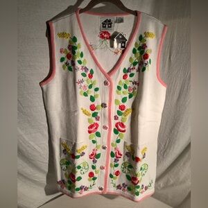 Storybook knit vest titled “Enchanted Garden”
